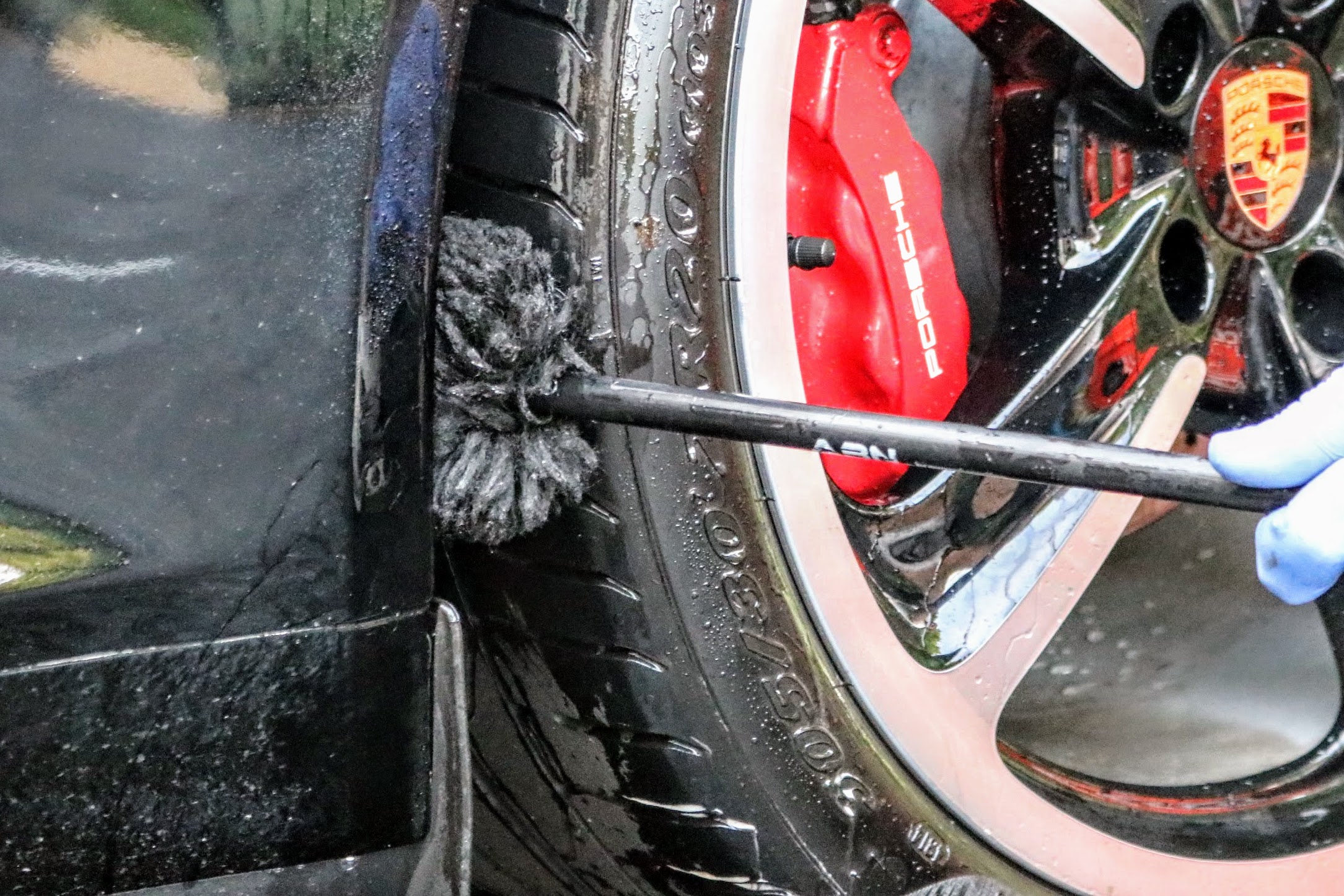 Using a Wheel Woolie and Adam's Polishes Tire and Rubber Cleaner to clean Porsche 911 (991.1) wheel wells
